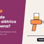 Ilustração de pistola de pintura elétrica laranja com copo de tinta pintando uma parede